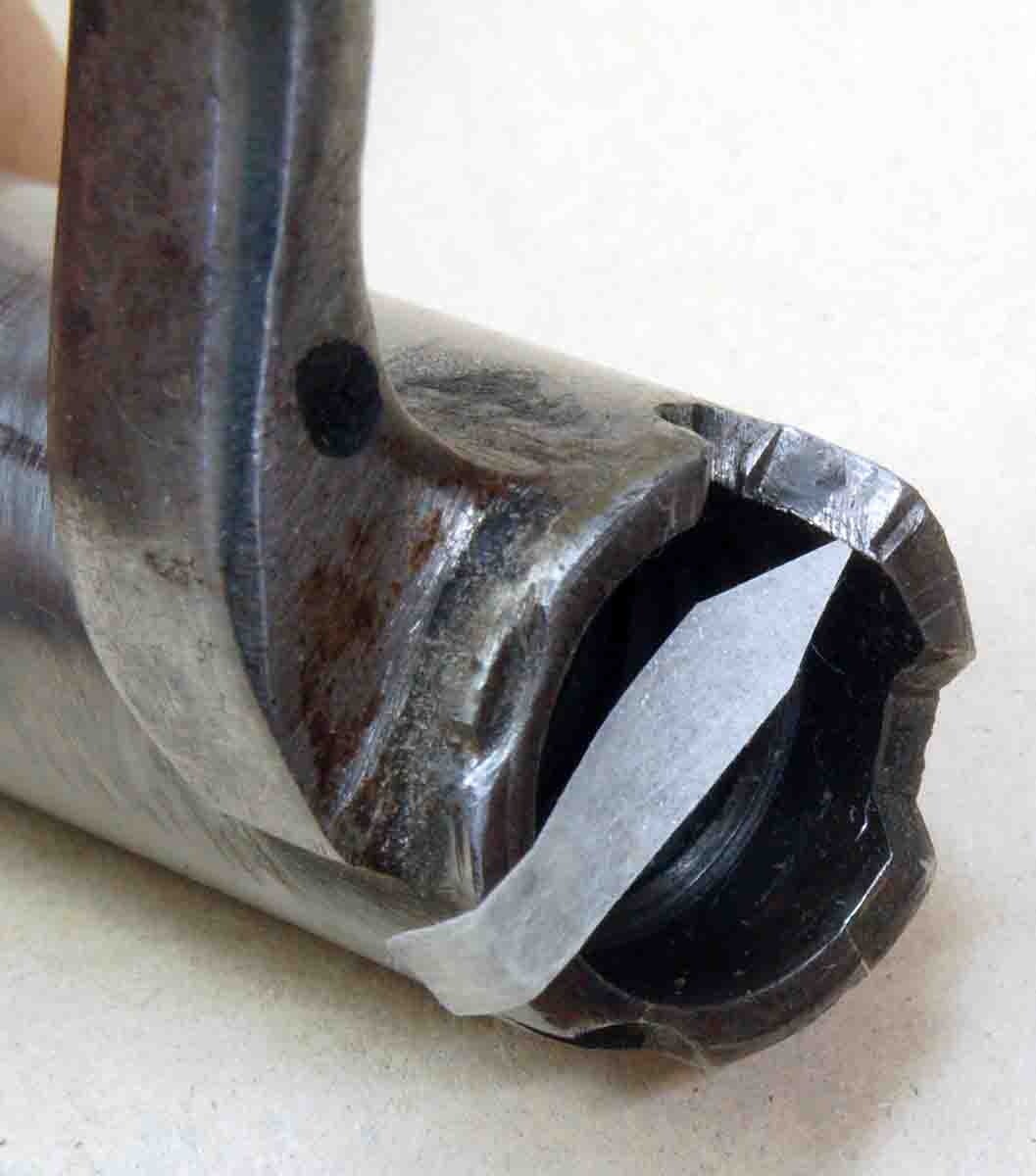 Shown is the galled cocking surface of an old military bolt annealed during alteration for low scope mounting.